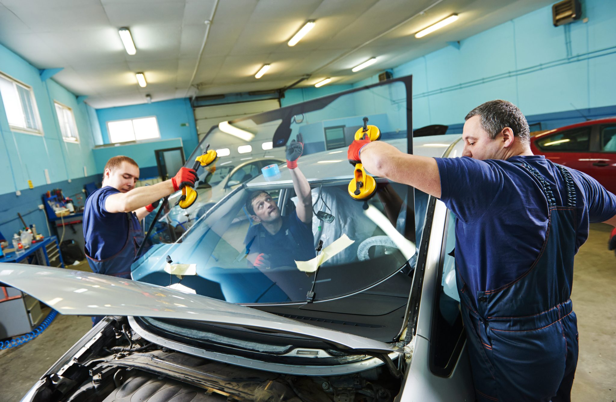 Dodge Durango windshield replacement in Phoenix, Arizona - windshield replacement work at an automotive service facility